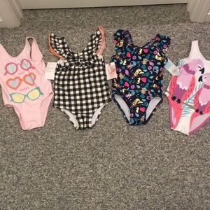 Bundle of cute bathing suits are new with tags